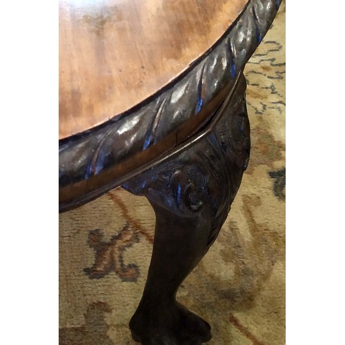 572 - LOW TABLE, George III style, oval top with pie crust border on cabriole legs with ball and claw feet... 