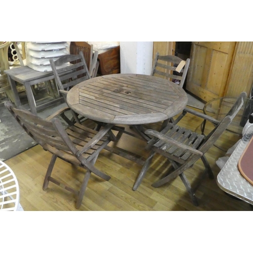 102 - ALEXANDER ROSE LTD GARDEN SET, including a table, 111cm Diam x 75cm H, and four chairs, 90cm H.