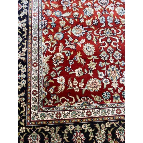 323 - FINE PURE SILK HEREKE DESIGN RUG, 156cm x 93cm.