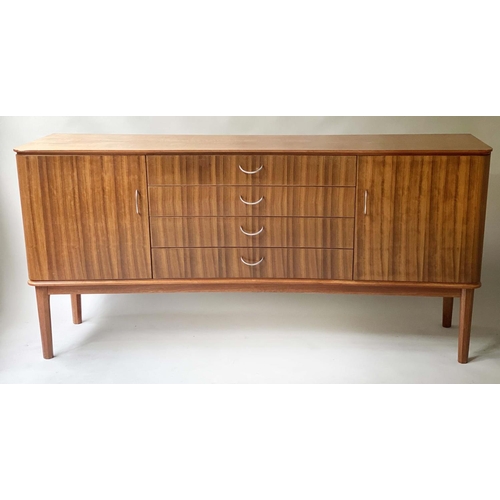 97 - GORDON RUSSELL STANWAY SIDEBOARD, 1960 teak and Indian Laurel, concave with four drawers flanked by ... 