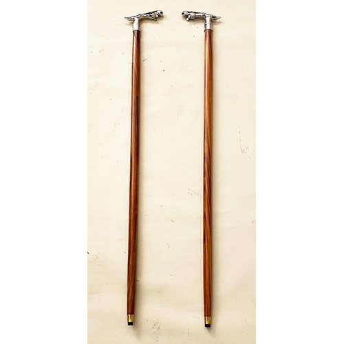 129 - WALKING STICKS, a pair, silver jaguar walnut cane. (2)