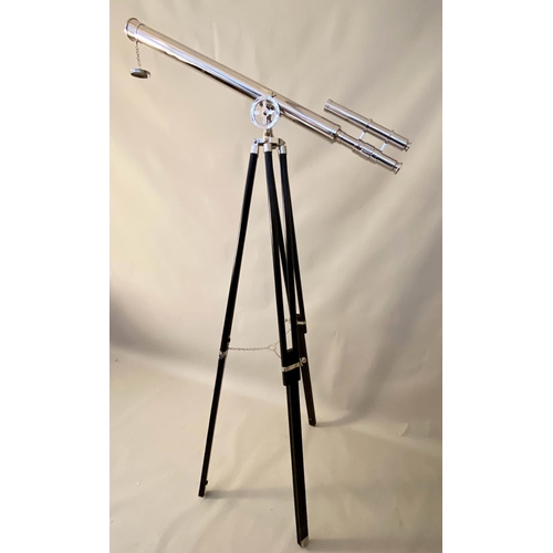 134 - TELESCOPE, silver with view finder, ebonised stand.