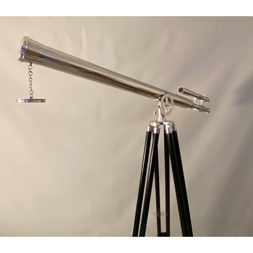 134 - TELESCOPE, silver with view finder, ebonised stand.