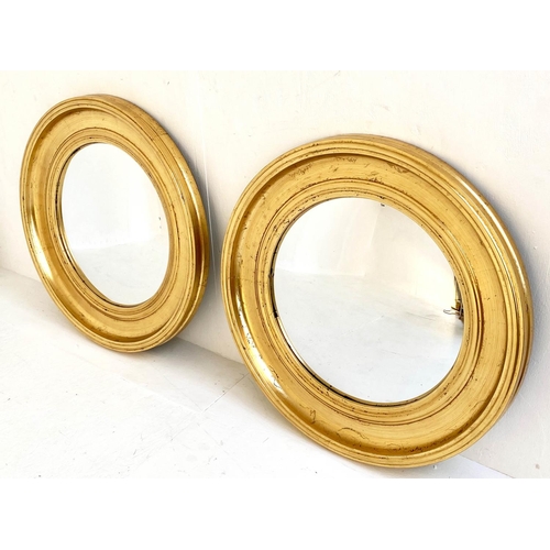 163 - CIRCLE CONVEX MIRRORS, a pair, 73cm x 73cm. (2)