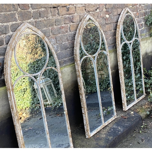 176 - GARDEN MIRRORS, three, Gothic style distressed metal frames, 122cm x 56cm.