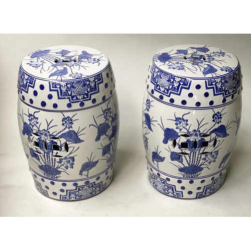 354 - BARREL STOOLS, a pair, Chinese blue and white pierced ceramic, 45cm H. (2)