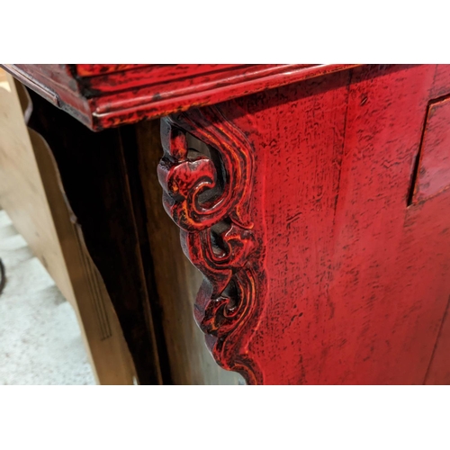 389 - CHINESE CABINET, 121cm x 95cm H x 47cm, red lacquer with two drawers above two doors.