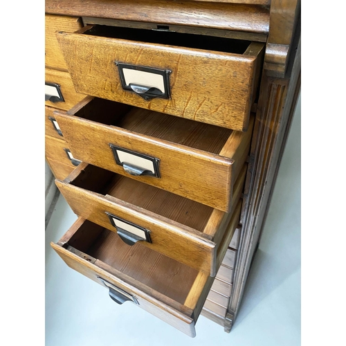 393 - FILING CHEST, late 19th/early 20th century oak having two banks of ten drawers, 131cm x 79cm x 47cm.