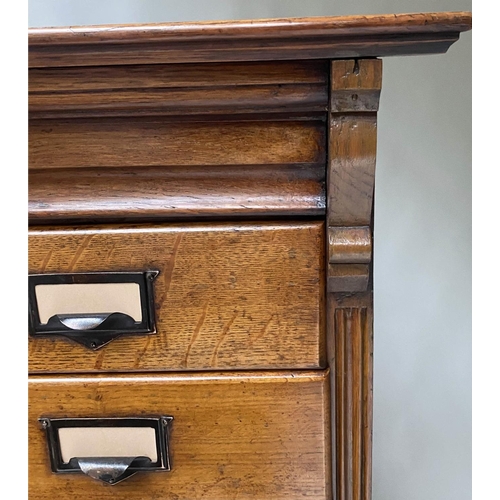 393 - FILING CHEST, late 19th/early 20th century oak having two banks of ten drawers, 131cm x 79cm x 47cm.