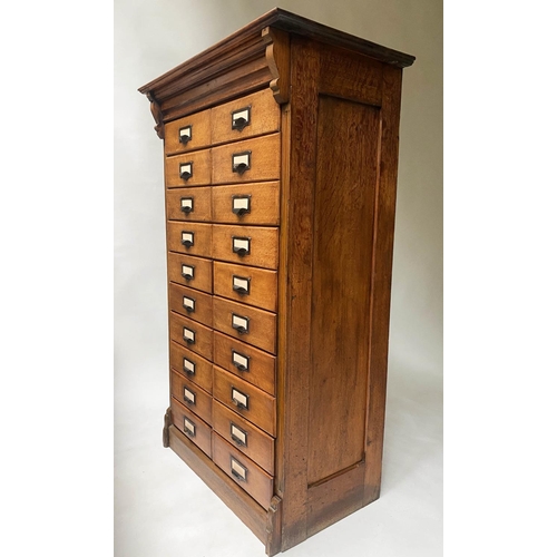 393 - FILING CHEST, late 19th/early 20th century oak having two banks of ten drawers, 131cm x 79cm x 47cm.