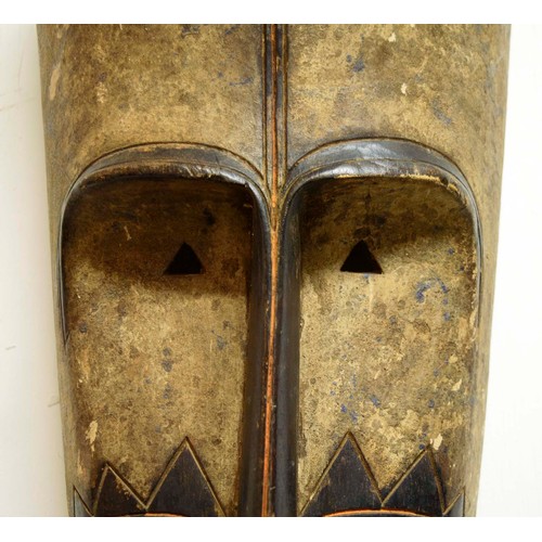 369 - NGIL HEADDRESS FANG MASK, hand carved wood, Gabon, 78cm x 30cm.