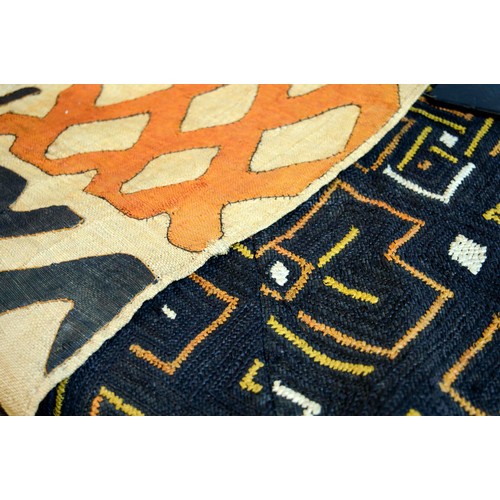 371 - KUBA TEXTILES, two, one with black background with yellow, orange and white diamond pattern, other w... 