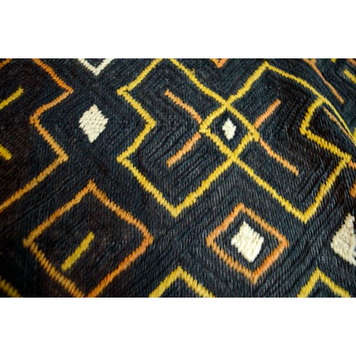 371 - KUBA TEXTILES, two, one with black background with yellow, orange and white diamond pattern, other w... 