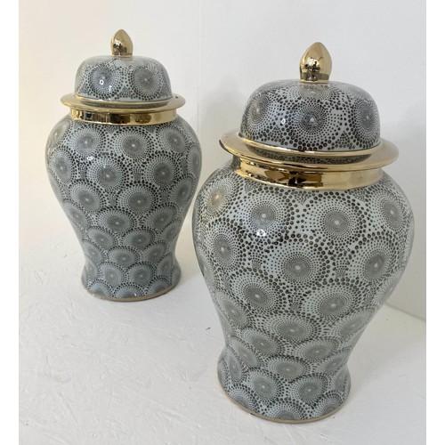 105 - TEMPLE JARS, a pair, 43cm H with covers. (2)