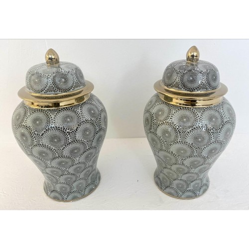 105 - TEMPLE JARS, a pair, 43cm H with covers. (2)