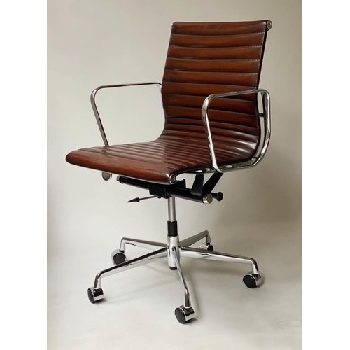 406 - REVOLVING DESK CHAIR, Charles and Ray Eames inspired ribbed leather revolving and reclining on an ad... 