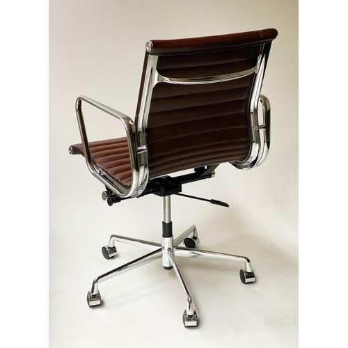 406 - REVOLVING DESK CHAIR, Charles and Ray Eames inspired ribbed leather revolving and reclining on an ad... 