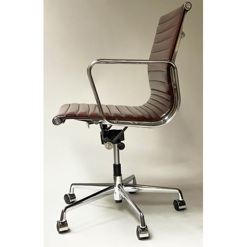 406 - REVOLVING DESK CHAIR, Charles and Ray Eames inspired ribbed leather revolving and reclining on an ad... 