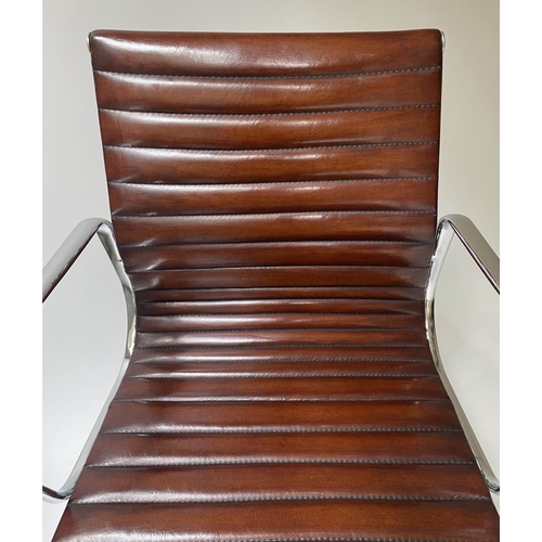 406 - REVOLVING DESK CHAIR, Charles and Ray Eames inspired ribbed leather revolving and reclining on an ad... 