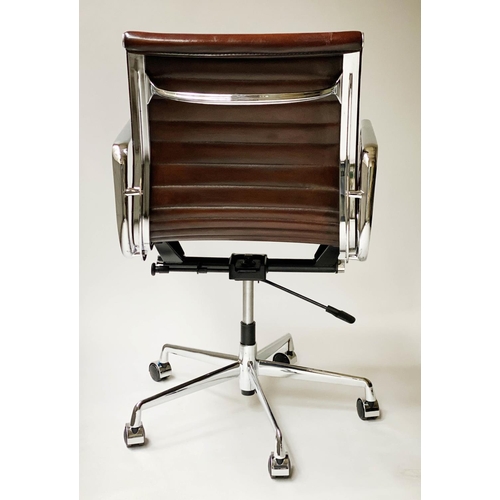 406 - REVOLVING DESK CHAIR, Charles and Ray Eames inspired ribbed leather revolving and reclining on an ad... 