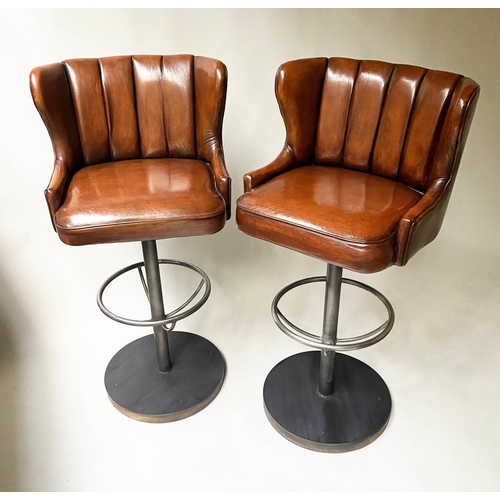 416 - BAR STOOLS, a pair, 116cm H, chair height 84cm, stitched tan leather, revolving on a steel base with... 