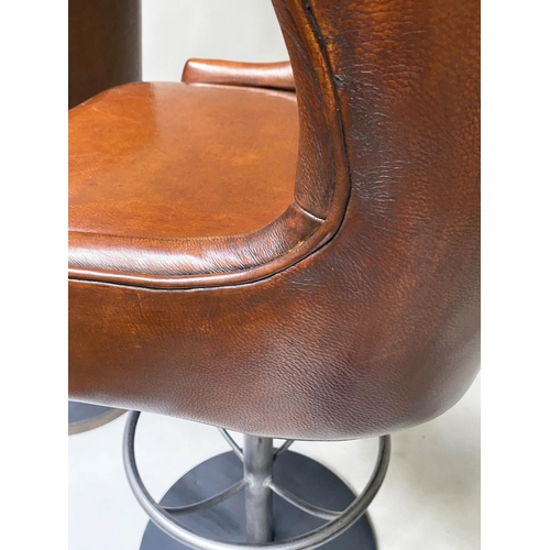 416 - BAR STOOLS, a pair, 116cm H, chair height 84cm, stitched tan leather, revolving on a steel base with... 