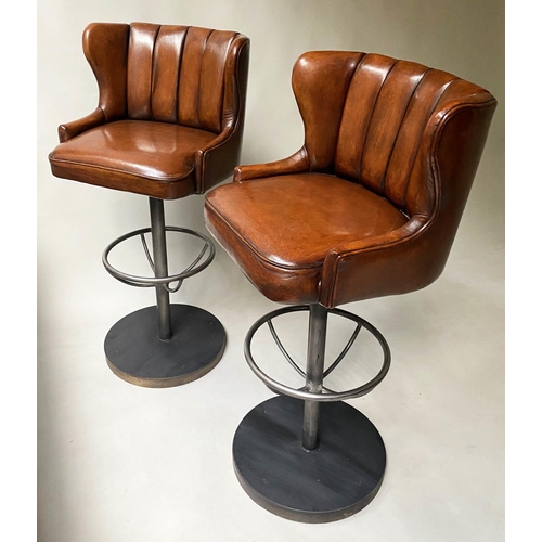 416 - BAR STOOLS, a pair, 116cm H, chair height 84cm, stitched tan leather, revolving on a steel base with... 