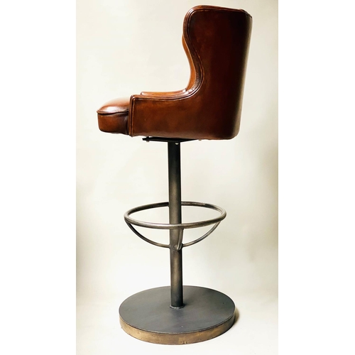 416 - BAR STOOLS, a pair, 116cm H, chair height 84cm, stitched tan leather, revolving on a steel base with... 