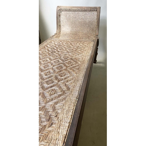 455 - ANGLO INDIAN DAYBED/CHAISE, late 19th/early 20th century, North Indian teak and cane panelled, with ... 