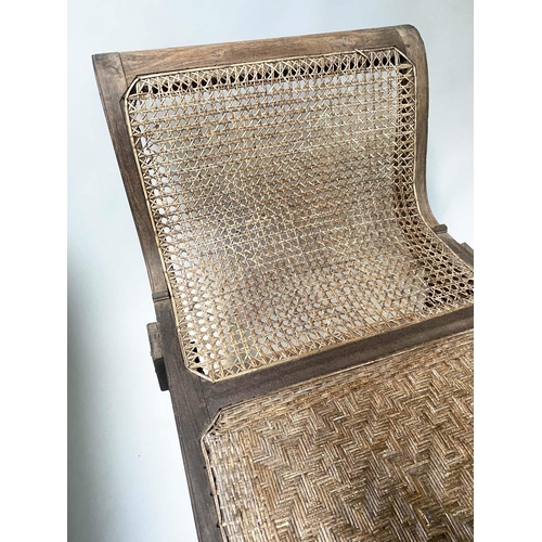 455 - ANGLO INDIAN DAYBED/CHAISE, late 19th/early 20th century, North Indian teak and cane panelled, with ... 