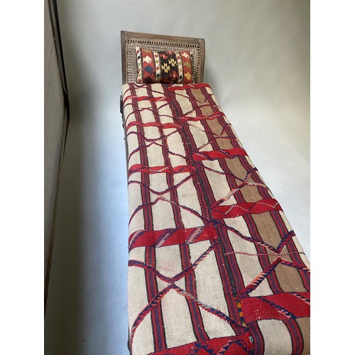 455 - ANGLO INDIAN DAYBED/CHAISE, late 19th/early 20th century, North Indian teak and cane panelled, with ... 