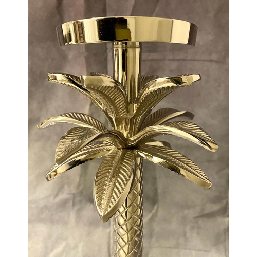 127 - PALM TREE CANDLE STICKS, a pair, 52cm H, polished metal (2).