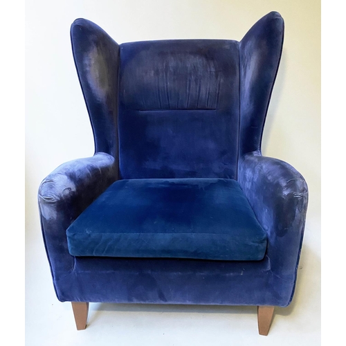 451 - WINGBACK ARMCHAIR, 1960's Danish style deep blue velvet upholstered, 85cm W.