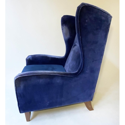 451 - WINGBACK ARMCHAIR, 1960's Danish style deep blue velvet upholstered, 85cm W.