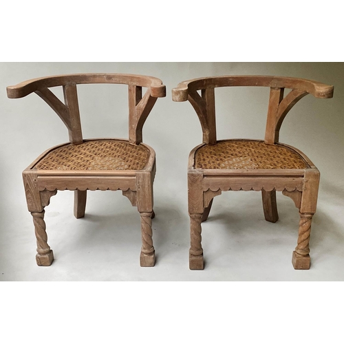 456 - ARMCHAIRS, a pair, 19th century Anglo colonial teak with arched backs and cane seats, 64cm W. (2)