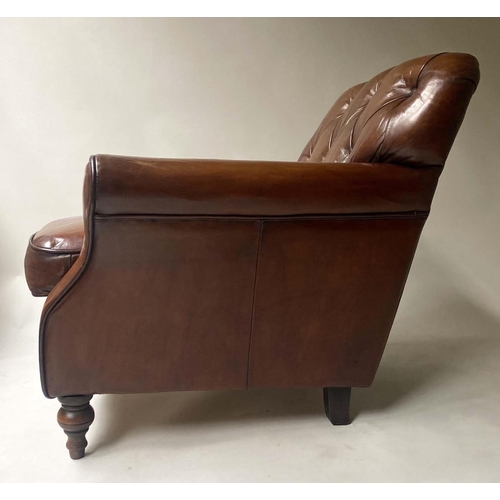 449 - CLUB ARMCHAIR, vintage buttoned brown leather with turned front supports, 76cm W.