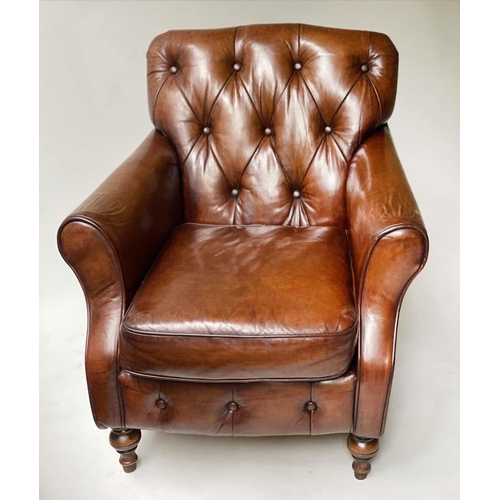 449 - CLUB ARMCHAIR, vintage buttoned brown leather with turned front supports, 76cm W.