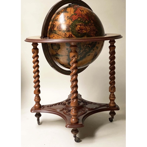 57 - GLOBE COCKTAIL CABINET, in the form of a terrestrial globe with rising lid and fitted interior, 103c... 