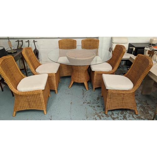 144 - CONSERVATORY DINING SET, including six chairs, 92cm H and table 130cm diam x 75cm rattan and glass.