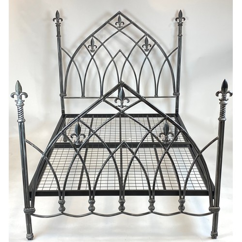 135 - DOUBLE BED FRAME, Gothic style with fleur-de-lis finals, 196cm L x 148cm H x 141cm W.