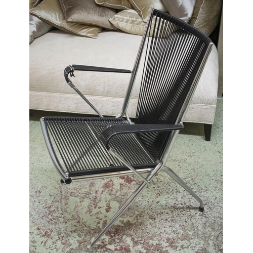 23 - FOLDING ARMCHAIRS BY ANDRE MONPOIX FOR MEUBLES T.V., a pair, 61cm W, chrome and black plastic. (2)