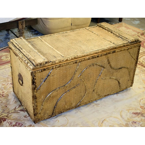 497 - TRUNK, 57cm H x 110cm x 52cm, early/mid 20th century bamboo with side handles and paper lined interi... 