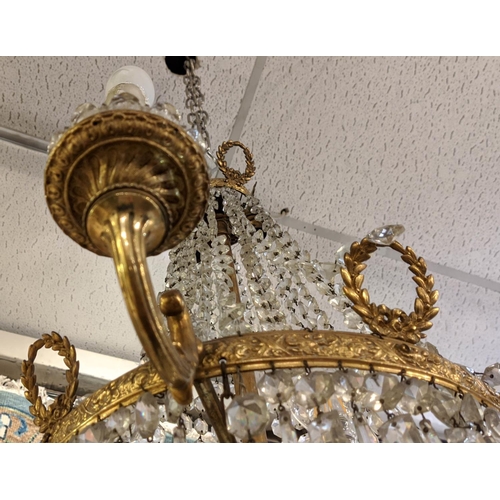 510 - CHANDELIER, approx. 60cm W x 70cm H, gilt metal with glass droplets.