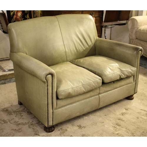 530 - CLUB SOFA, 83cm H x 130cm W, faded green leather.