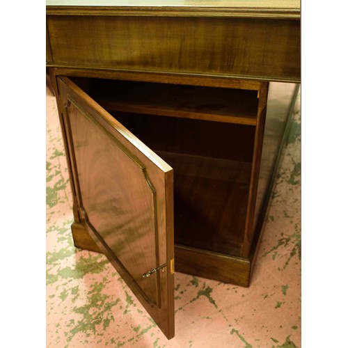 523 - PARTNER'S DESK, by Shaw of London, 77cm H x 183cm x 106cm, Georgian style mahogany with green leathe... 