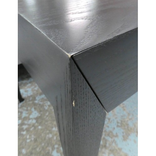 4 - BIRGIT ISRAEL DESK, 140cm W x 70cm D x 76cm H, black finish, with four drawers.