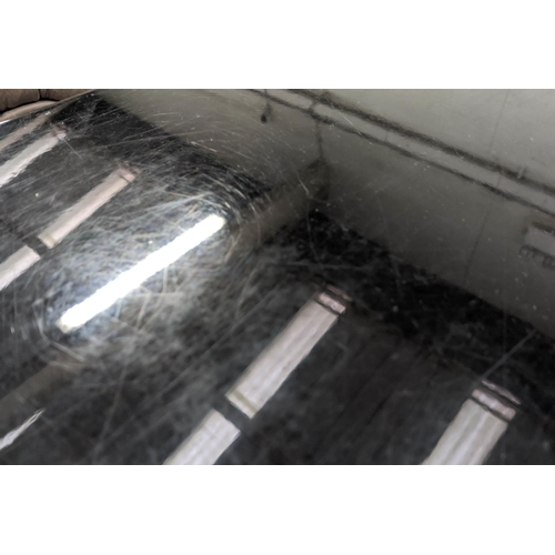 92 - CONSOLE TABLE, 40cm x 78cm H x 131cm, black gloss of concave outline.