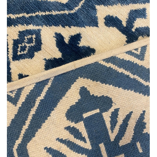 401 - LUKE IRWIN SILK AND WOOL CARPET, 270cm x 185cm.