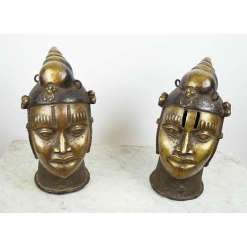 124 - BENIN OBA HEADS, a pair, bronze, 40cm H. (2)