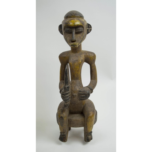 128 - SENOUFO STATUES, a pair, 60cm H, from the Ivory Coast. (2)